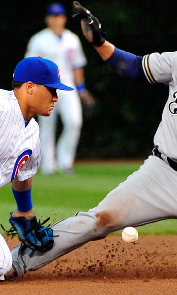 Brewers stave off host Cubs